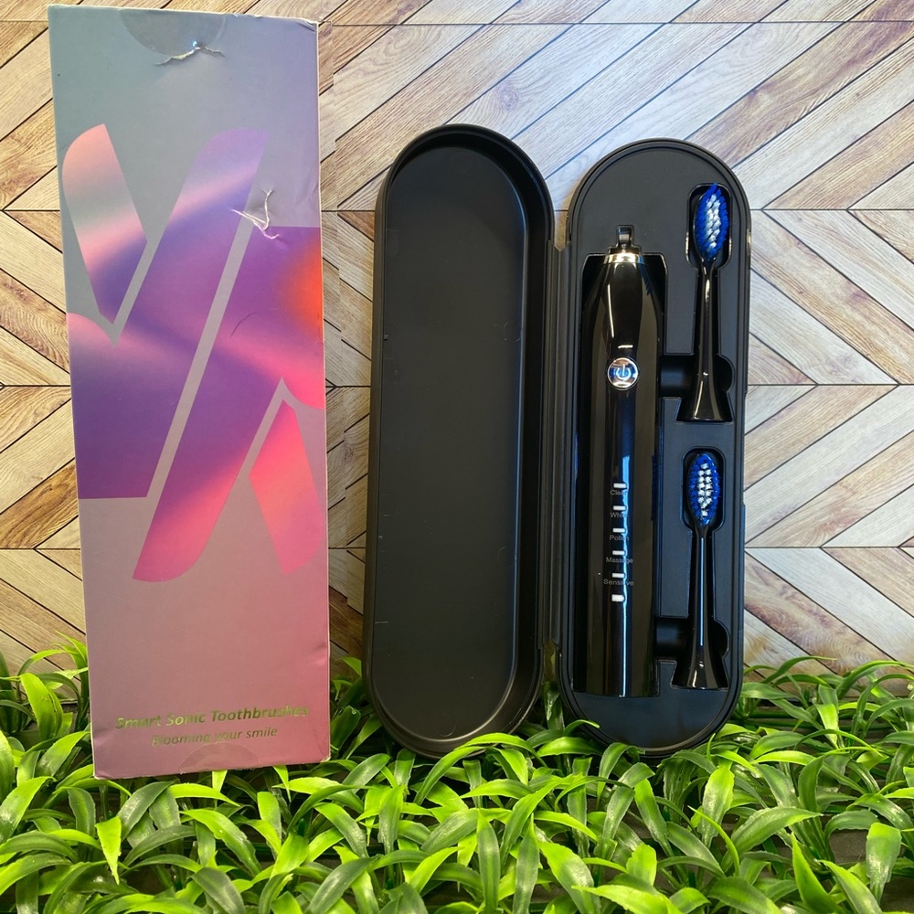 Smart Sonic Electric Toothbrush. Brand new in box.